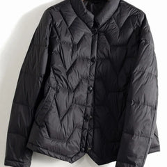 Women’s Aurora short quilted puffer jacket by Christine Brewer, featuring a stylish, padded design and a warm, insulated look.