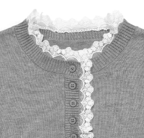 Women's knit sweater by Christine Brewer featuring a cozy, stylish design with a classic fit and textured knit pattern.