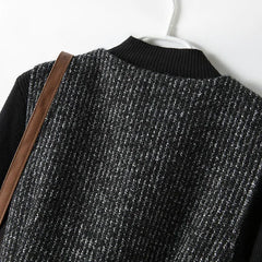 Longline belted tweed coat for women by Christine Brewer, featuring classic tailored design and textured fabric.