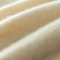 Helen cashmere sweater for women by Christine Brewer, featuring a cozy knit design in a soft, neutral color.