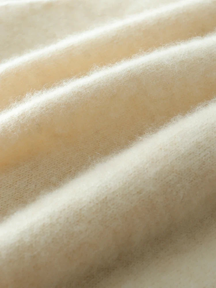Helen cashmere sweater for women by Christine Brewer, featuring a cozy knit design in a soft, neutral color.