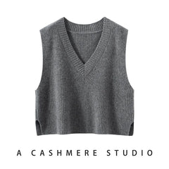 Cashmere ribbed knit sweater vest for women by Christine Brewer, featuring a cozy, textured design in neutral tones.