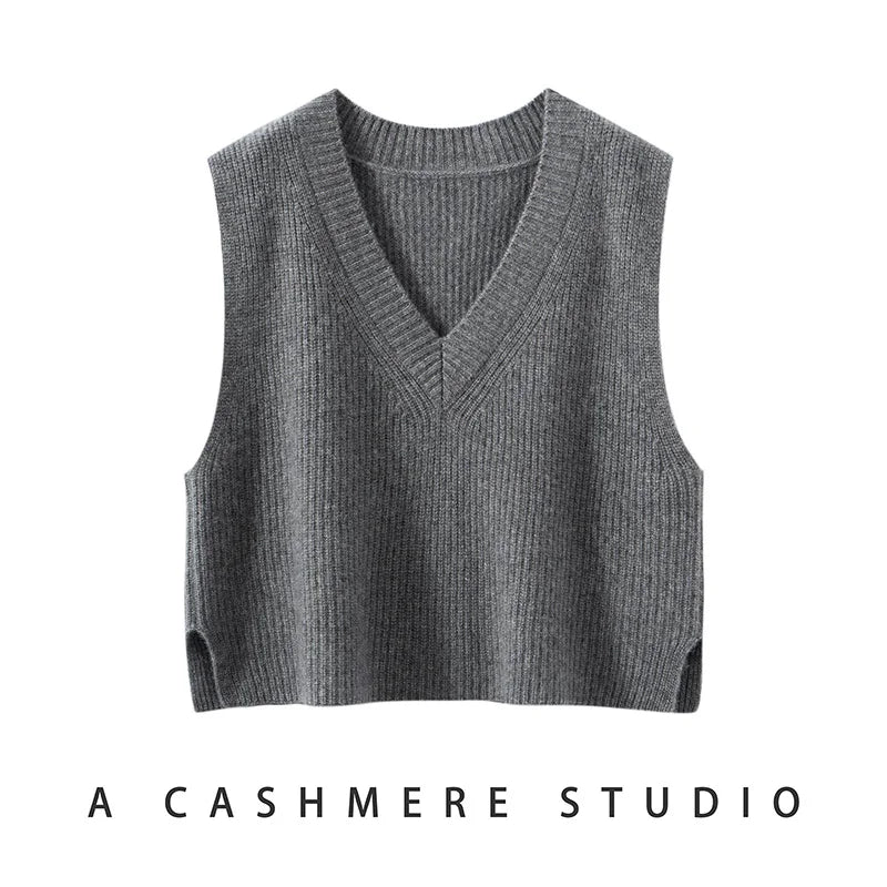 Cashmere ribbed knit sweater vest for women by Christine Brewer, featuring a cozy, textured design in neutral tones.