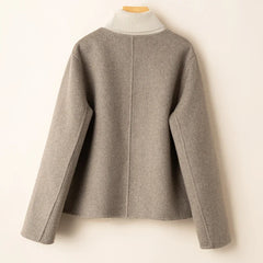 Evelyn wool coat for women by Christine Brewer, stylish and elegant in a classic design, shown in a neutral color.