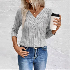Kaitlyn striped women's sweater by Christine Brewer featuring a cozy, stylish knit with bold horizontal stripes and a round neckline.