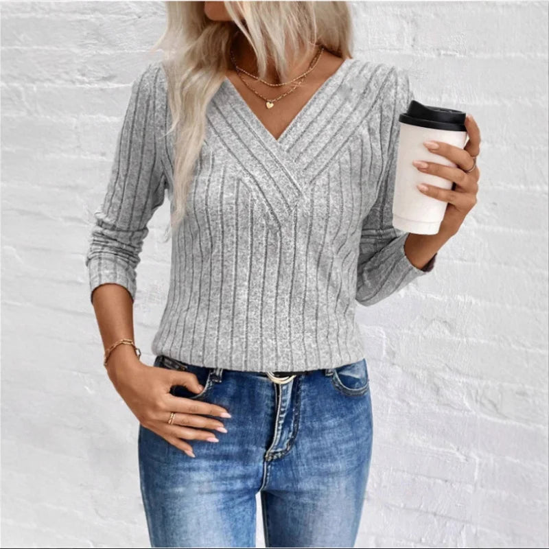 Kaitlyn striped women's sweater by Christine Brewer featuring a cozy, stylish knit with bold horizontal stripes and a round neckline.