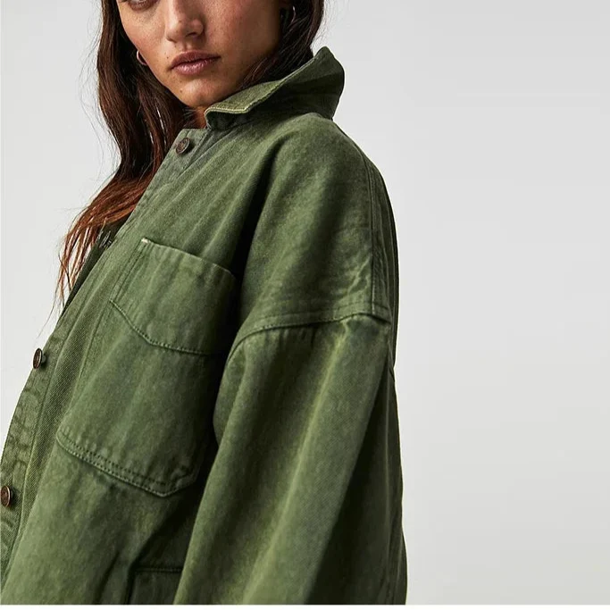 Oversized Charlotte denim shirt jacket for women by Christine Brewer, featuring classic blue denim with button closure and collar.
