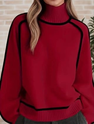 Christine Brewer Eva loose fit roll neck sweater in a tailored chic style, shown in a cozy, soft fabric with a relaxed fit.
