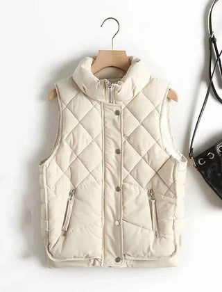 Ruby stand collar puffer vest for women by Christine Brewer, featuring a quilted design and cozy stand-up collar.