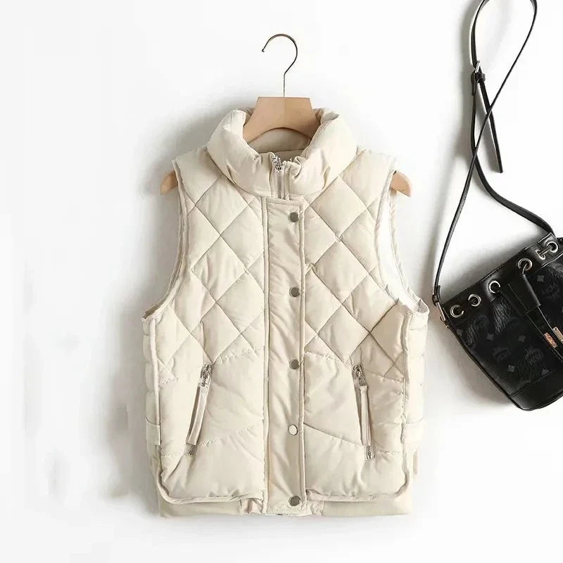 Ruby stand collar puffer vest for women by Christine Brewer, featuring a quilted design and cozy stand-up collar.