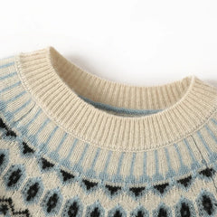 Cream-colored Christine Brewer Jolene cashmere mock neck sweater for women, shown on a model with a cozy, stylish fit.