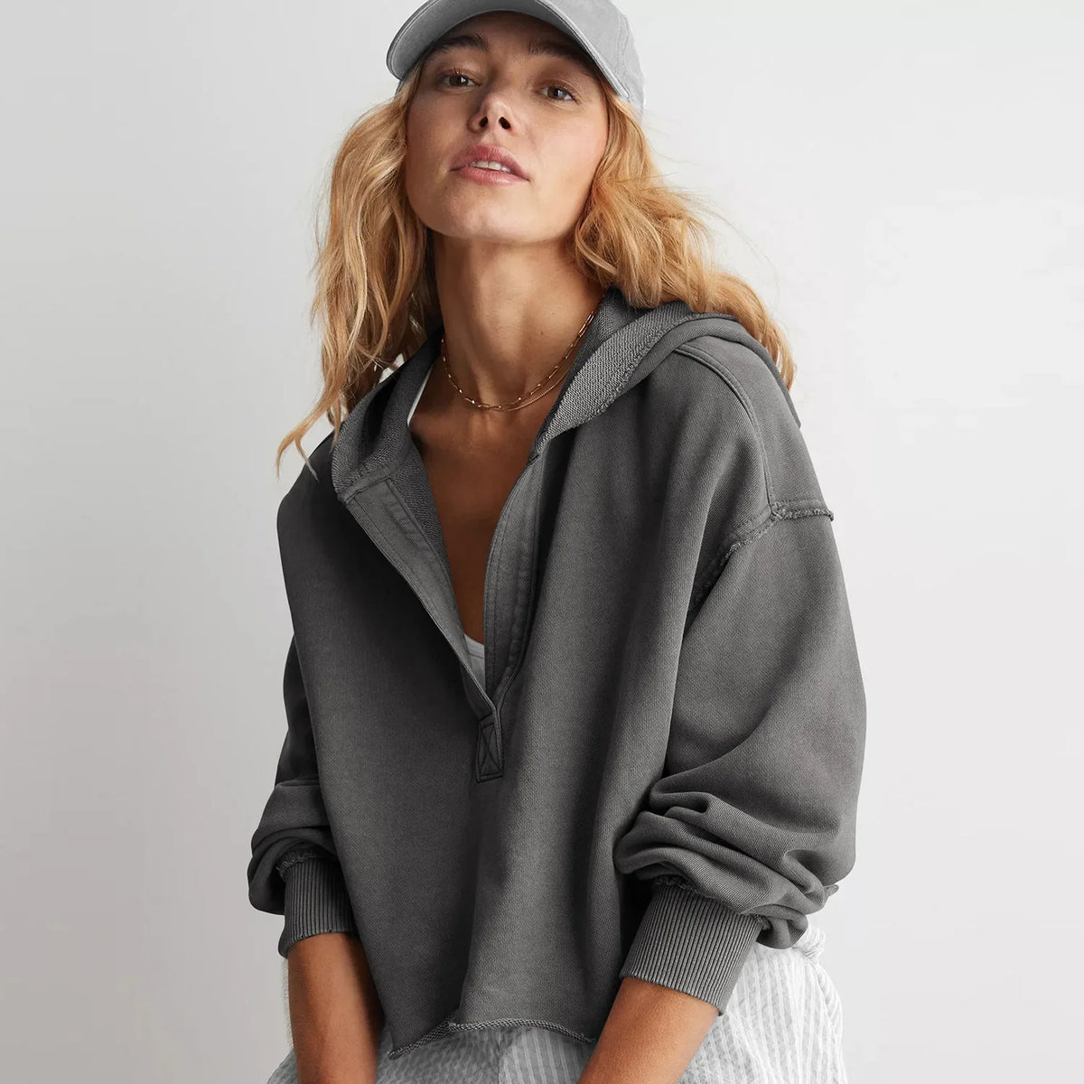 Pink cropped hoodie for women from Christine Brewer's Eleanor collection, featuring a relaxed fit and casual style.