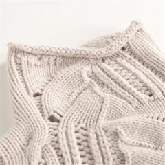Women's Marnie knit sweater by Christine Brewer, featuring a cozy, textured design in soft, warm yarn.