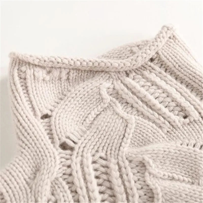 Women's Marnie knit sweater by Christine Brewer, featuring a cozy, textured design in soft, warm yarn.