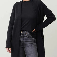 Women’s Jacqueline Merino wool cardigan by Christine Brewer, featuring a cozy, fitted design in neutral tones.