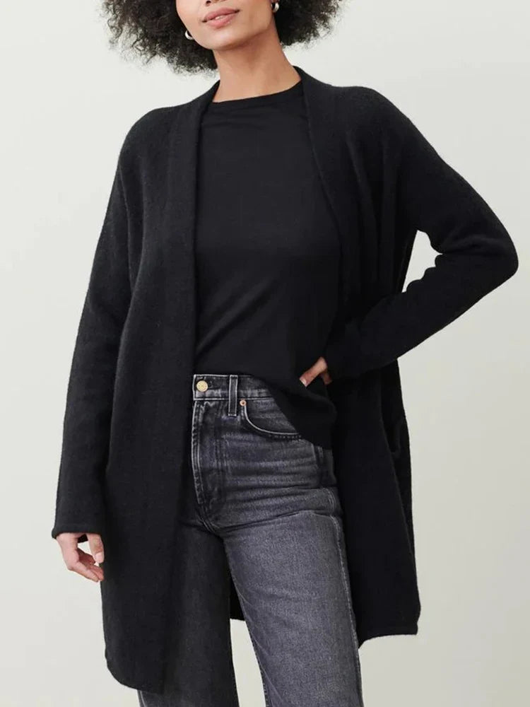 Women’s Jacqueline Merino wool cardigan by Christine Brewer, featuring a cozy, fitted design in neutral tones.