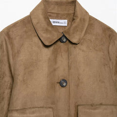 Hazel faux suede cropped jacket for women by Christine Brewer, shown in a stylish, close-up view highlighting the soft suede texture.