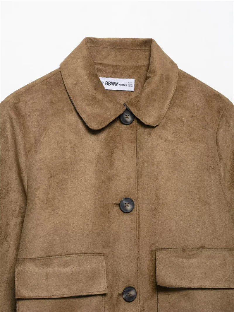 Hazel faux suede cropped jacket for women by Christine Brewer, shown in a stylish, close-up view highlighting the soft suede texture.