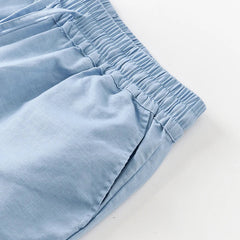 Women’s cotton linen wide-leg drawstring trousers by Christine Brewer, loose pull-on pants, soft and comfortable for casual wear.