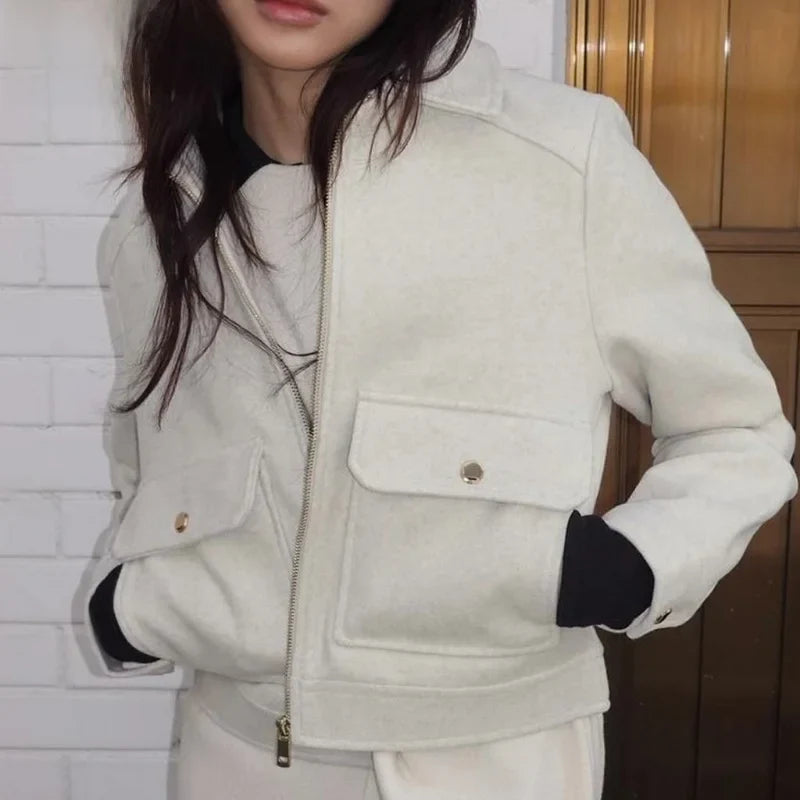 Christine Brewer Isla cropped zip-up utility jacket for women, featuring a stylish, functional design with multiple pockets and a zip closure.