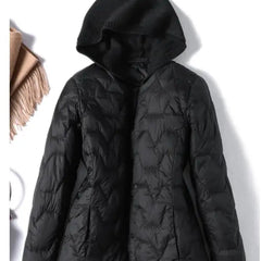 Christine Brewer Zoe women's hooded quilted puffer jacket, featuring a stylish quilted design and cozy hood for cold weather.