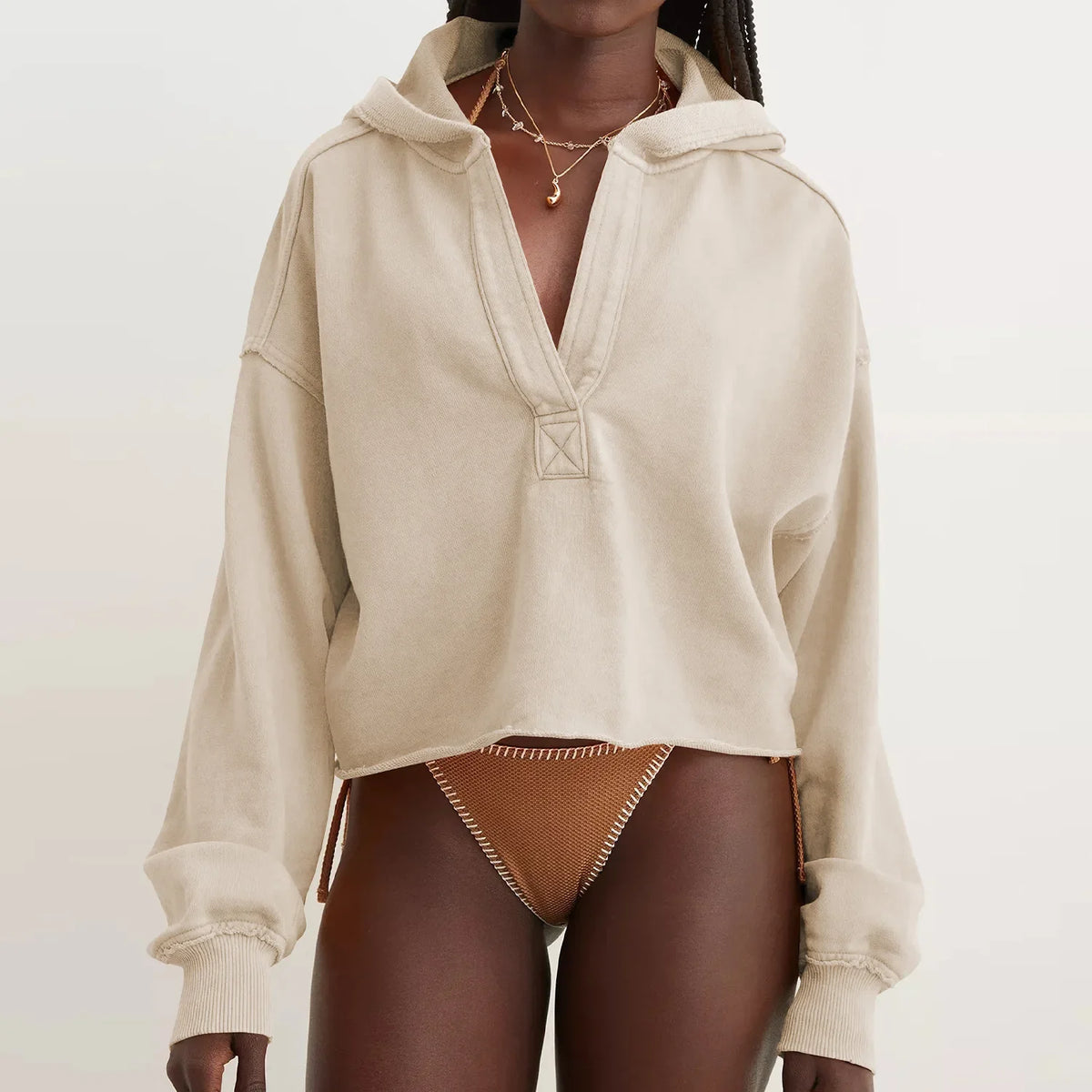 Pink cropped hoodie for women by Christine Brewer, featuring a comfortable fit and casual style.