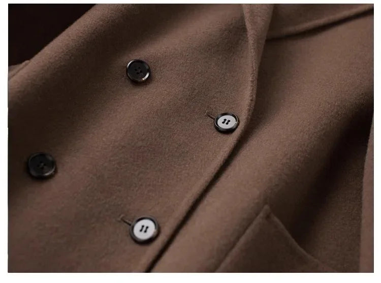 Brown double-breasted wool coat for women by Christine Brewer, featuring classic lapels and tailored fit.
