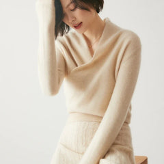 Christine Brewer Dawn women's cashmere sweater in soft beige, featuring a cozy, relaxed fit and ribbed cuffs.