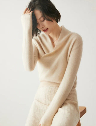 Christine Brewer Dawn women's cashmere sweater in soft beige, featuring a cozy, relaxed fit and ribbed cuffs.