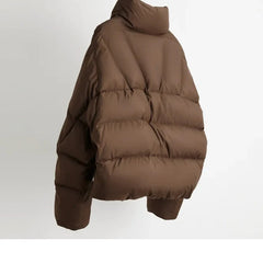 Women's cropped quilted parka jacket by Christine Brewer, stylish outerwear with a quilted design and warm insulation.
