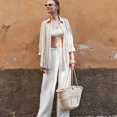 Women’s knit wide-leg drawstring trousers by Christine Brewer, featuring a loose fit and pull-on style in a soft, comfortable fabric.
