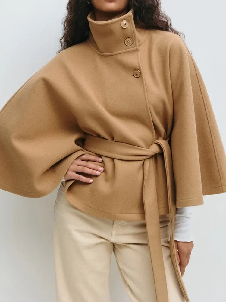 Emma belted cape coat for women by Christine Brewer, stylish outerwear with a flowing design and belt detail.