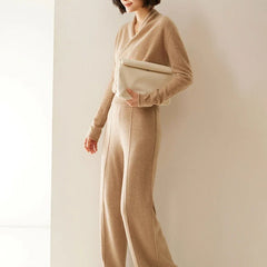 Women’s Dawn cashmere sweater by Christine Brewer, soft beige knit with long sleeves and ribbed cuffs, casual and cozy style.