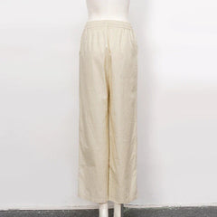 Women’s cotton linen wide leg drawstring trousers by Christine Brewer, loose pull-on pants with relaxed fit and comfortable style.