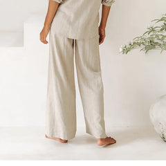 Women’s linen wide-leg trousers by Christine Brewer, loose pull-on pants with relaxed fit in light, breathable fabric.