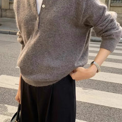 Women's wool hoodie sweater by Christine Brewer featuring a cozy, stylish design in soft wool fabric.