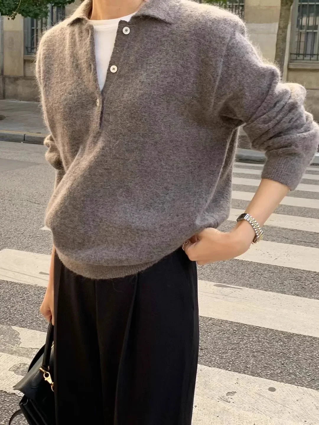 Women's wool hoodie sweater by Christine Brewer featuring a cozy, stylish design in soft wool fabric.
