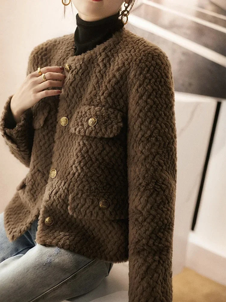 Women’s velvet short jacket by Christine Brewer, featuring a stylish and fitted design, shown in a close-up image.