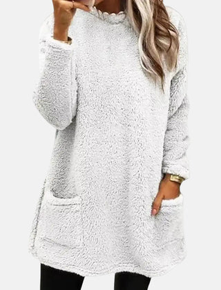 Pink knit sweater for women from Christine Brewer's Estelle collection, featuring a cozy, textured design and long sleeves.