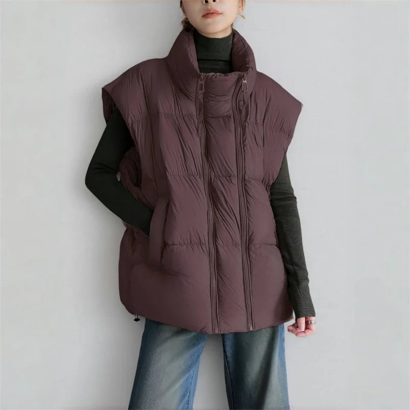 Christine Brewer Layla cropped puffer vest for women, shown in a stylish, quilted design perfect for layering and outdoor wear.