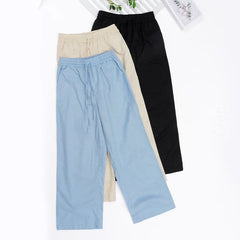 Women’s cotton linen wide leg drawstring trousers by Christine Brewer, loose pull-on pants with a relaxed fit and comfortable waistband.