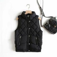 Ruby stand collar puffer vest for women by Christine Brewer, shown in a sleek, quilted design with a stand collar.