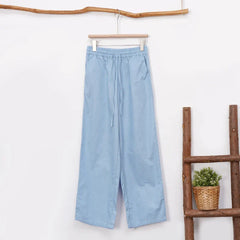 Women’s cotton linen wide-leg drawstring trousers by Christine Brewer, loose pull-on pants, relaxed fit, comfortable for casual wear.