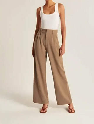 White wide-leg high-waist pants for women by Christine Brewer, featuring a sleek fit and stylish design.