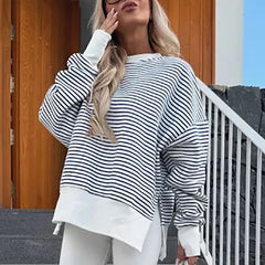 Christine Brewer Haven striped women's sweatshirt with a relaxed fit, featuring bold horizontal stripes in various colors.