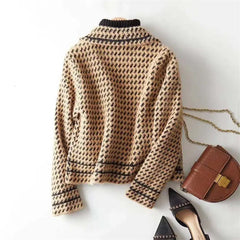 Isabella Christine Brewer women's cropped double-breasted knit cardigan, beige, front view with buttons and textured fabric.