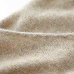 Helen cashmere sweater for women by Christine Brewer, soft beige knit with ribbed cuffs and neckline.