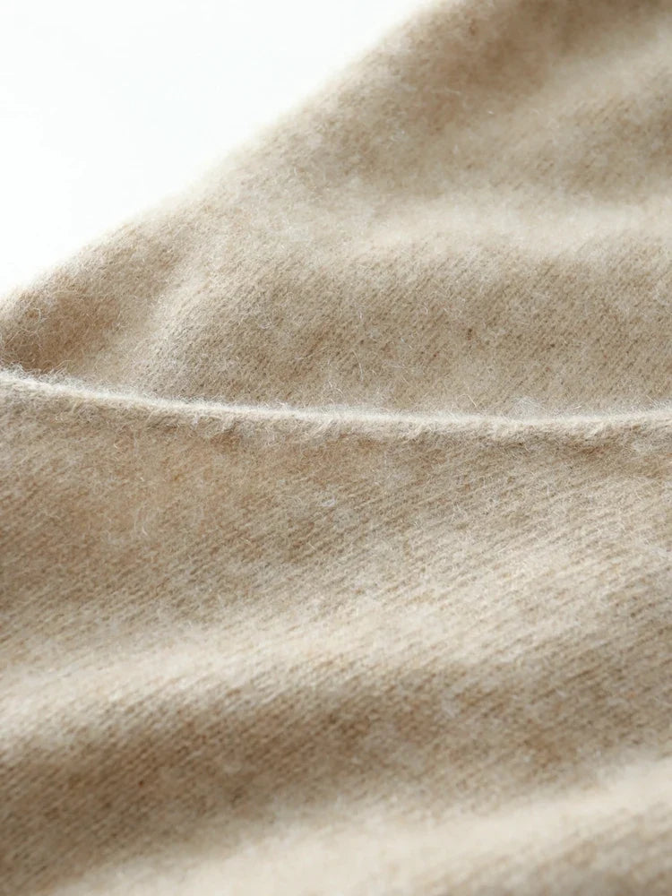 Helen cashmere sweater for women by Christine Brewer, soft beige knit with ribbed cuffs and neckline.