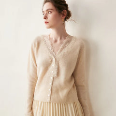 Elsa cashmere cardigan for women by Christine Brewer, soft and cozy, shown in a neutral color on a model.
