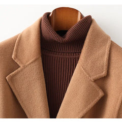 Olivia long belted wool coat for women by Christine Brewer, featuring a tailored fit and classic design in neutral wool fabric.